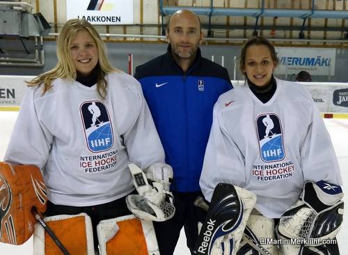 Former NHL and Austrian national goalie Reinhard Divis gives something back to girls (left Inka Kuusinen from Finland, right Maria Meza from Mexico) at the 2014 IIHF Hockey Development Camp in Vierumäki, and learns for building a goalie coach program at home.
