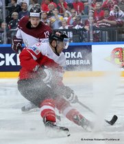 IIHF World Championship 2015 Preliminary Round AUT - LAT Manuel Latusa #15,Guntis Galvins #13 © Andreas Robanser/Puckfans.at