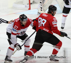 IIHF World Championship 2015 Preliminary Round SUI - AUT Konstantin KOMAREK (AUT) &; Kevin ROMY (SUI) © Werner Krainbucher/Puckfans.at 
