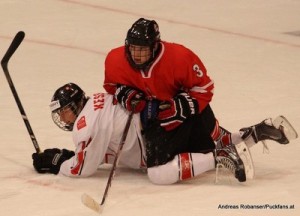 IIHF U18 World Championship 2014 Finland  1/4Final CAN-SUI Joe Hicketts #3 , Tino Kessler #14