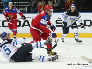 IIHF World Championship 2014  Atte Ohtamaa #5, Alexander Ovechkin #8 , Tommi Kivistö #6