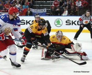 IIHF World Championship 2014  Nikolai Kulyomin #41 , Moritz Müller #91, Philipp Grubauer #30 , Igor Dremelj (REF)