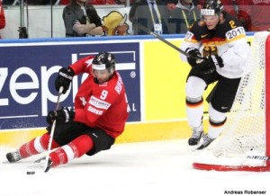 IIHF World Championship 2014  Thomas Rüfenacht #9 , Denis Reul #2