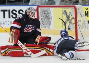 IIHF World Championship 2014  Tim Thomas #30 , Jyri Marttinen #28