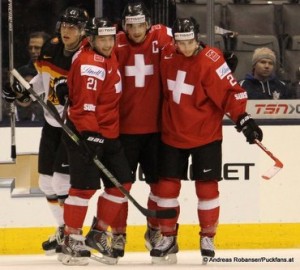 World Junior Championship 2015 Relegation Game 1SUI-GER Luca Fazzini #21, Luca Hischier #13, Dorian Saeftel  #7 © Andreas Robanser/Puckfans.at 