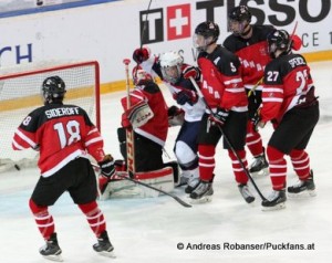 IIHF U18 World ChampionshipArena 1/2 Final CAN - USA Deven Sideroff #18, Colin White #27, Guillaume Brisebois #5, Matt Spencer #27 © Andreas Robanser/Puckfans.at 