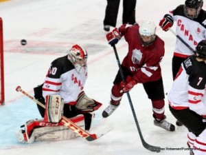 IIHF U18 World Championship CAN - LAT Zach Sawchenko #30, Bruno Priede #22 © Andreas Robanser/Puckfans.at 