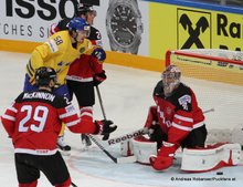 IIHF World Championship 2015 Preliminary RoundSWE - CAN Nathan MacKinnon #29, Anton Lander #58, Mike Smith #41 © Andreas Robanser/Puckfans.at