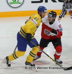 IIHF World Championship 2015 Preliminary Round AUT - SWE Jimmie ERICSSON (SWE); Konstantin KOMAREK (AUT) ⒸWerner Krainbucher/Puckfans.at