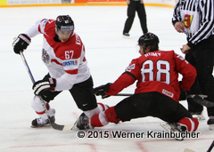 IIHF World Championship 2015 Preliminary Round SUI - AUT Konstantin KOMAREK (AUT); Kevin ROMY (SUI) © Werner Krainbucher/Puckfans.at  