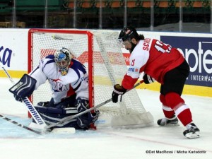 2016 IIHF World Championship Division 1 AUT - KOR Matt Dalton #30, Michael Schiechl #13 ©Det MacRossi / Micha Karlsdottir