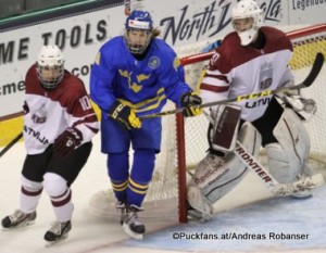 2016 IIHF U18 World Championship LAT - SWE Ralph Engelstad Arena, Grand Forks Deniss Smirnovs #10, Axel Jonsson Fjällby #16, Mareks Egils Mitens #30 ©Puckfans.at/Andreas Robanser