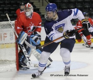 2016 IIHF U18 World Championship FIN - CAN Ralph Engelstad Arena, Grand Forks Evan Fitzpatrick #1, Jesse PuljuJarvi #9 ©hockeyfans.ch/Andreas Robanser