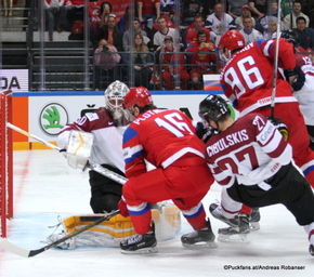 2016 IIHF World Championship Russia, Ice Palace, Moscow  LAT - RUS Elvis Merzlikins #30, Sergei Plotnikov #16, Oskars Cibulskis #27, Alexander Burmistrov #96 ©Puckfans.at/Andreas Robanser